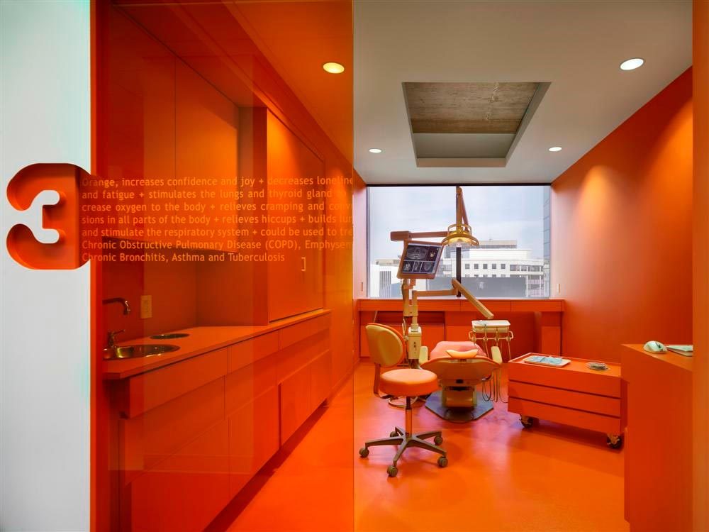 Design-orange-room-at-Implantlogyca-Dental-Office-Interiors.jpg