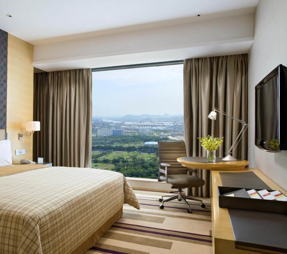 广州福朋喜来登酒店Four Points by Sheraton Guangzhou第三页更新_14)Four Points by Sheraton Guangzhou, Dongpu—Deluxe Room - Bedroom 拍攝者.jpg