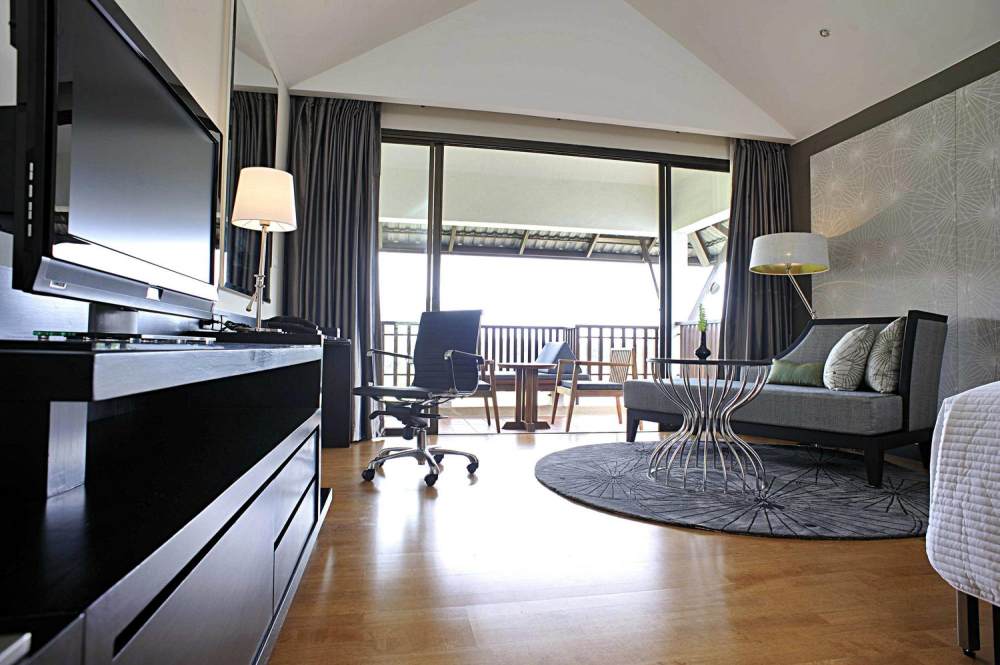 26)Le Meridien Chiang Rai Resort, Thailand—Guest Room Wooden Floor Living Area .jpg
