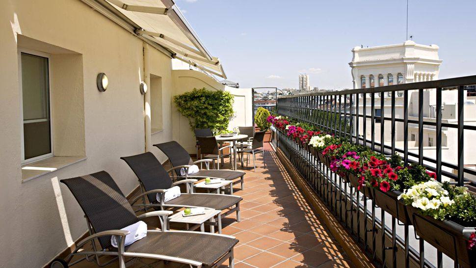 Rockwell Group -马德里威斯汀皇宫酒店 The Westin Palace Madrid_002938-10-lounge-chairs.jpg