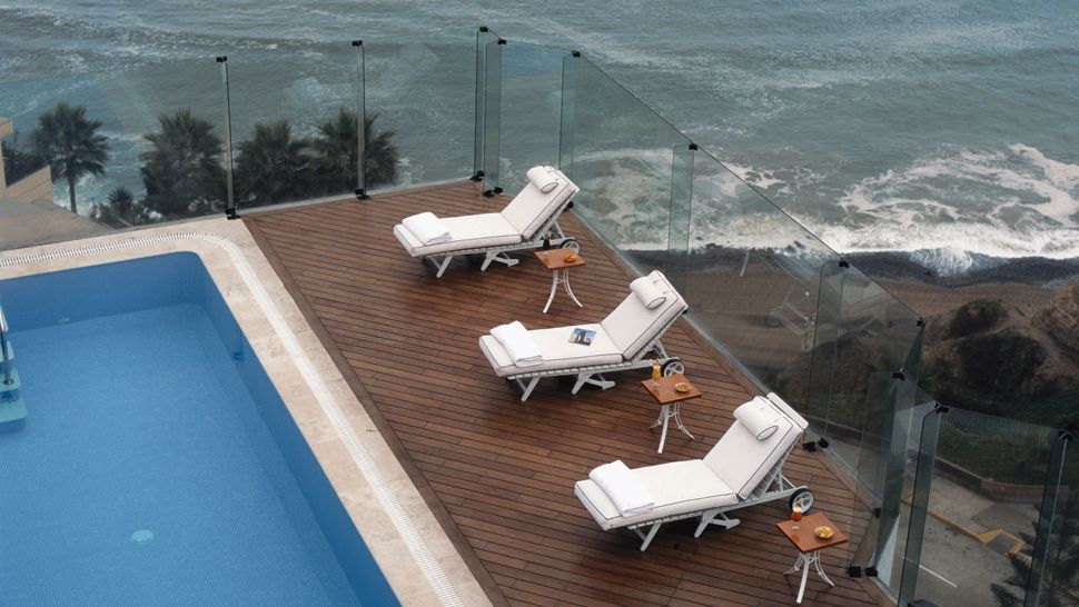 米拉弗洛雷斯公园酒店 / 利馬,秘魯_000116-06-exterior-pool-ocean.jpg
