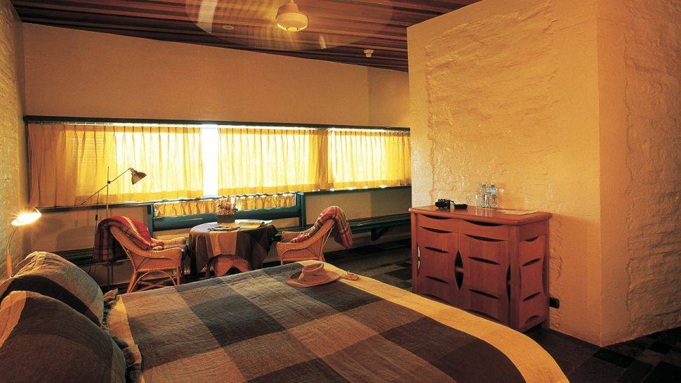 Explora Hotel in 阿塔卡马 / 智利_002241-04-bedroom-king-bed.jpg