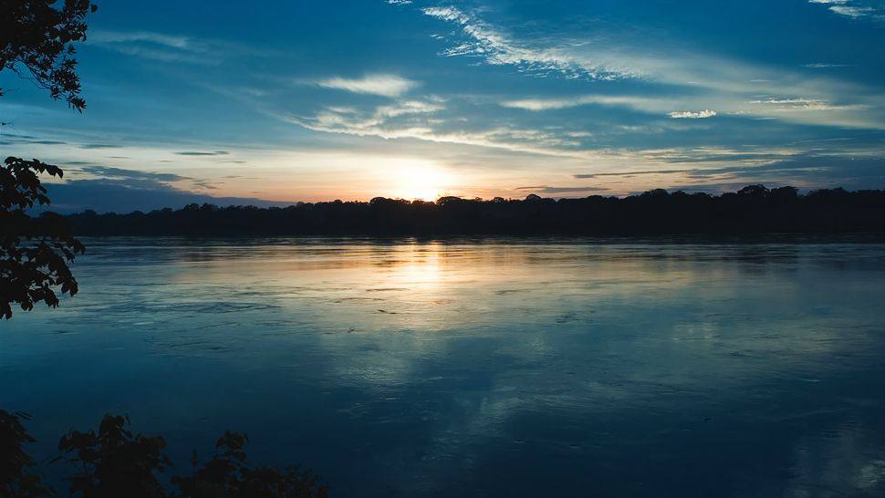 秘鲁Inkaterra Reserva Amazonica酒店_004777-12-Madre-de-Dios-river-sunset.jpg