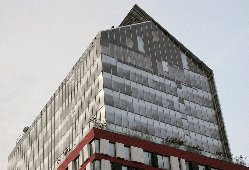 让·努维尔: C1大厦完工_顶部立面选用了玻璃幕墙材料