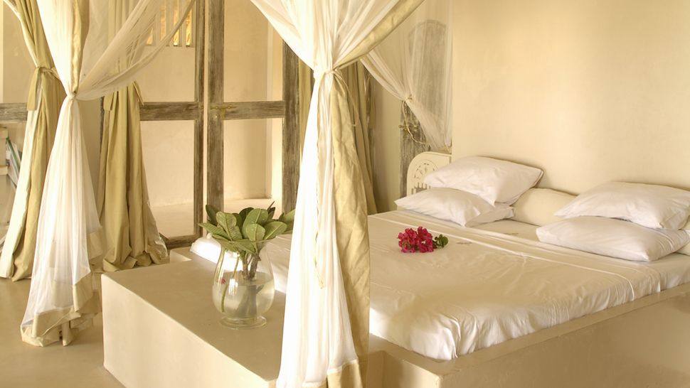 非洲肯尼亚蒙巴萨Msambweni Beach House & Private Villas_005637-08-canopy-bed.jpg