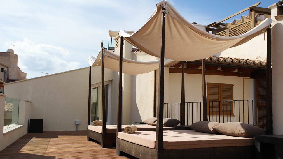西班牙 马略卡岛PURO OASIS URBANO_002560-03-roof-cabanas.jpg