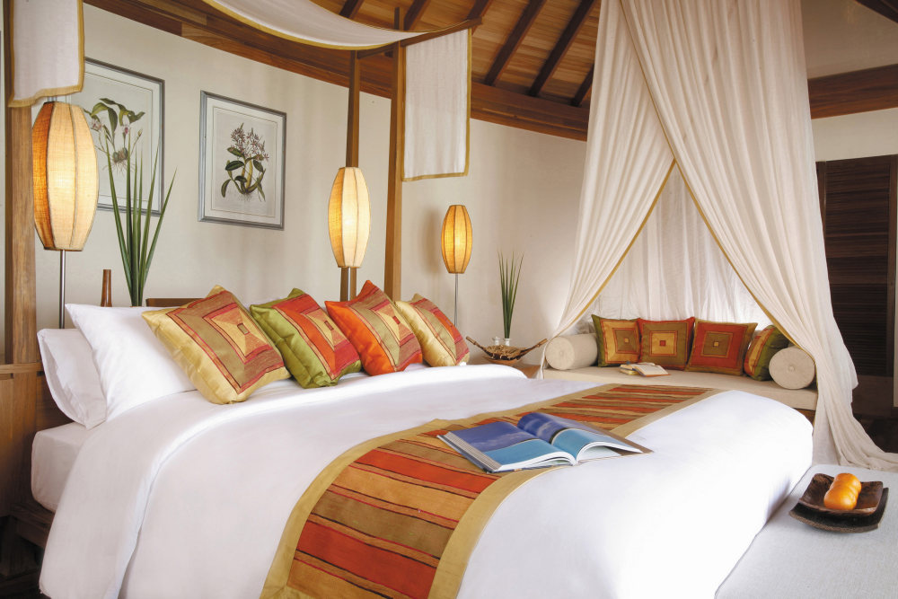 Deluxe Overwater Suite bedroom.jpg