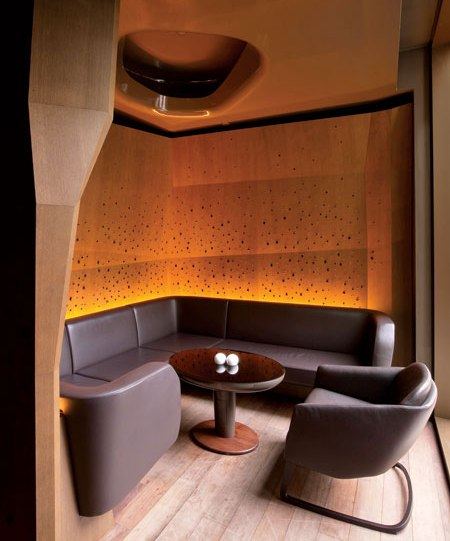 Restaurant @ M. Oriental Paris_385186-Crystal_inlaid_oak_veneer_wraps_a_nook_in_the_bar_Seating_and_tables_thro.jpg