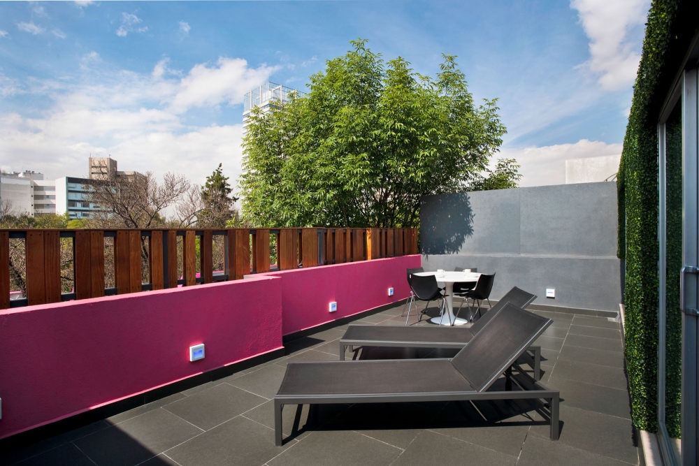 墨西哥市 Hostel La Buena Vida_5049812128ba0d0c590001b3_hostel-la-buena-vida-arco-arquitectura-contempor-nea_ho.jpg