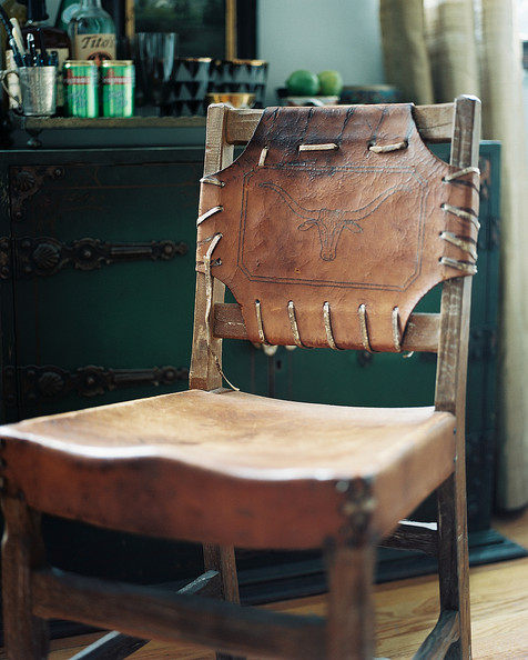 Furniture leather wood chair beside green XismhnierASl.jpg