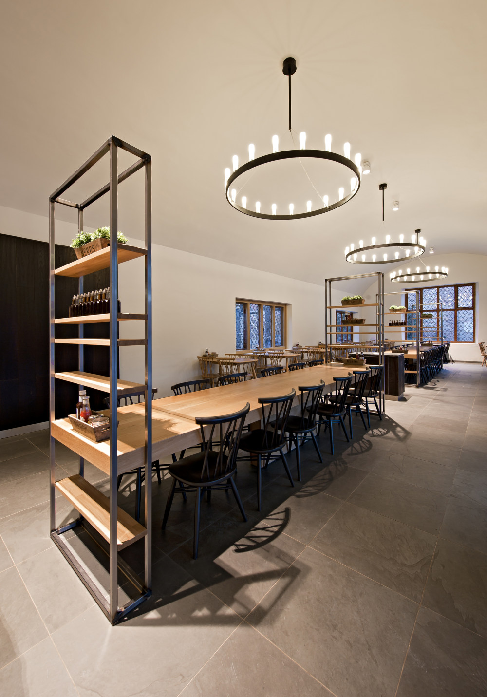 20-Bespoke-communal-tables-with-integrated-display-shelving.jpg