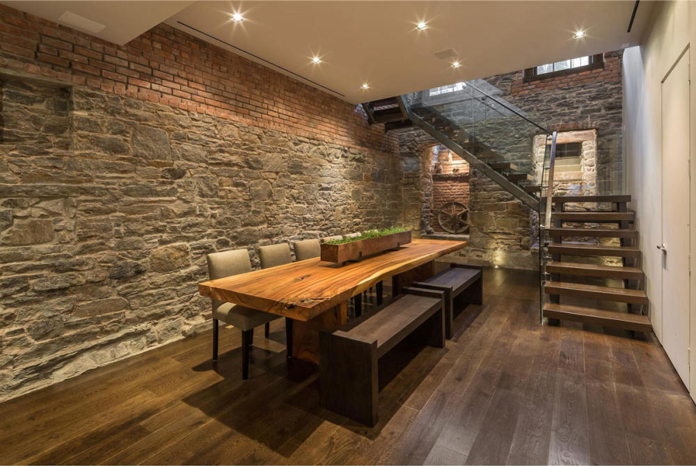 美国纽约--Townhouse Conversion_Washington-Place-New-York-Dining-Room-Stone-Brick-Walls-Rustic-Dining-Table.jpg