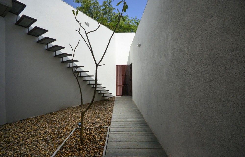 印度艾哈迈达巴德--Gorgeous Single Floor House With Concrete Finishes_Cut-Outs.jpg