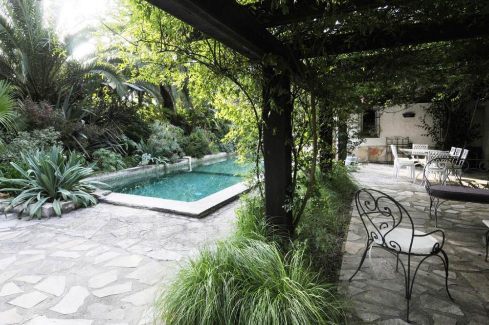 Pergola-pool-view-with-shrubbery.jpg