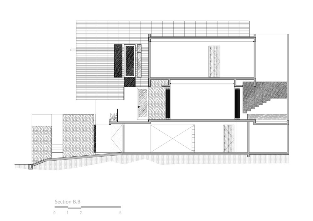 51638d67b3fc4bc5260002b3_lumber-shaped-box-house-atelier-riri_section_-3-.jpg