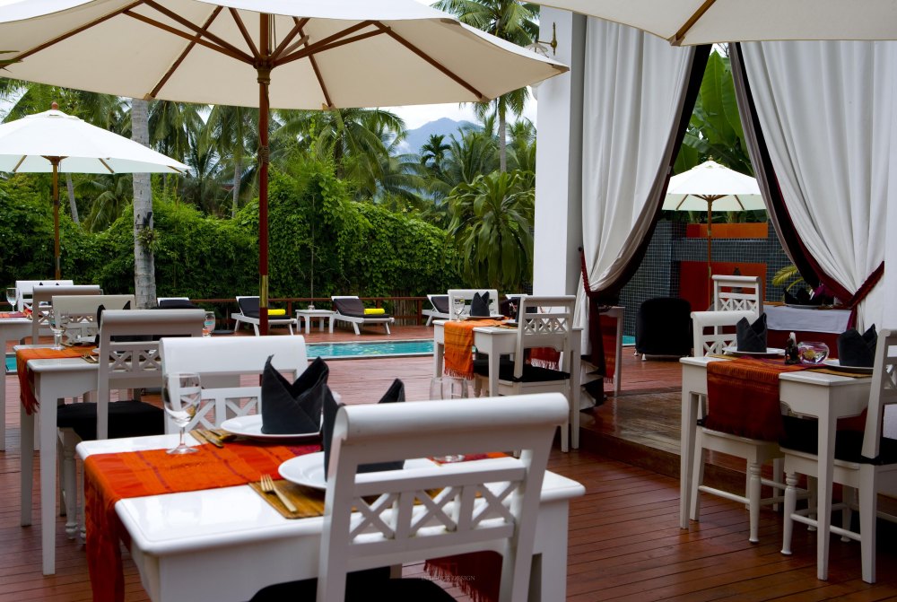 老挝桑维纳方姆酒店 Maison Souvannaphoum Hotel_27800240-H1-CAMS_Restaurant_Elephant Blanc Terrace.jpg