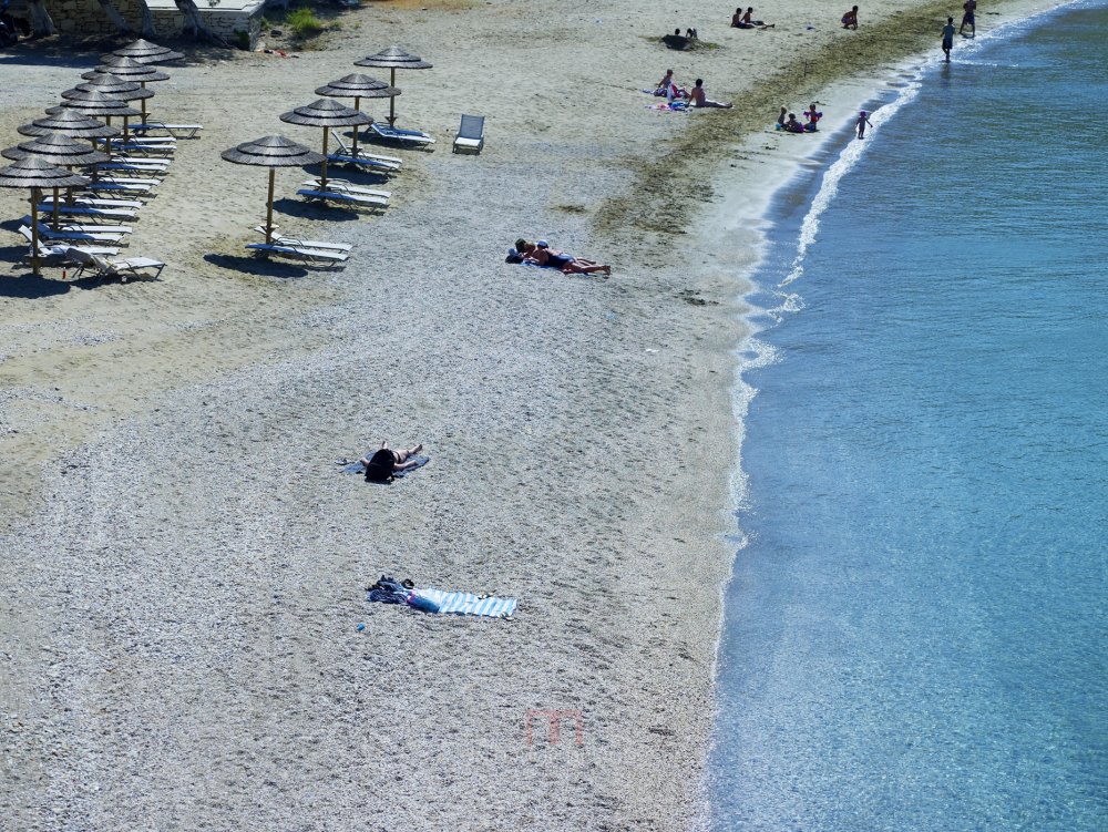 希腊Porto Kea Suites_51336500-H1-swimming_in_Korissia_beach.jpg