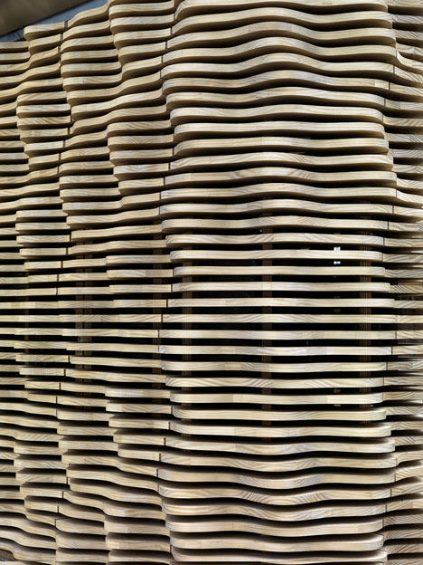 London-flower-kiosk-with-a-wavy-timber-exterior-by-Buchanan-Partnership_dezeen_11.jpg