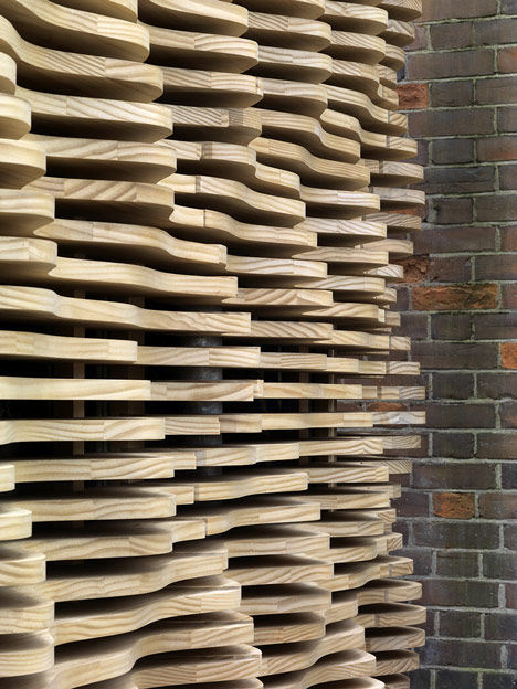 London-flower-kiosk-with-a-wavy-timber-exterior-by-Buchanan-Partnership_dezeen_14.jpg