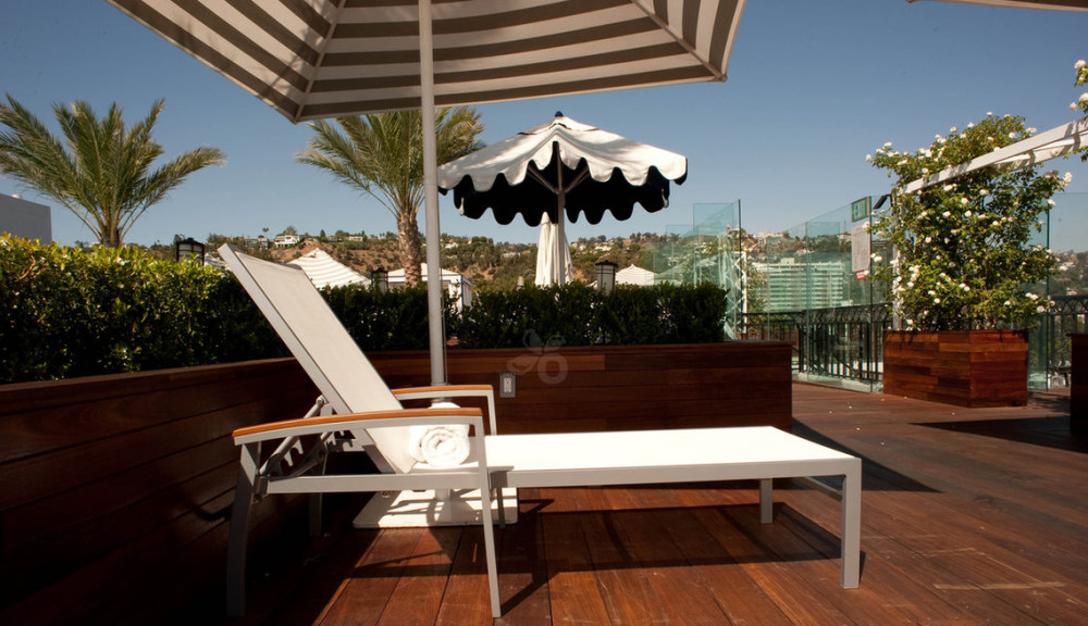 The London West Hollywood_lounge-chairs-pool-bel-age-v493449-1152.jpg