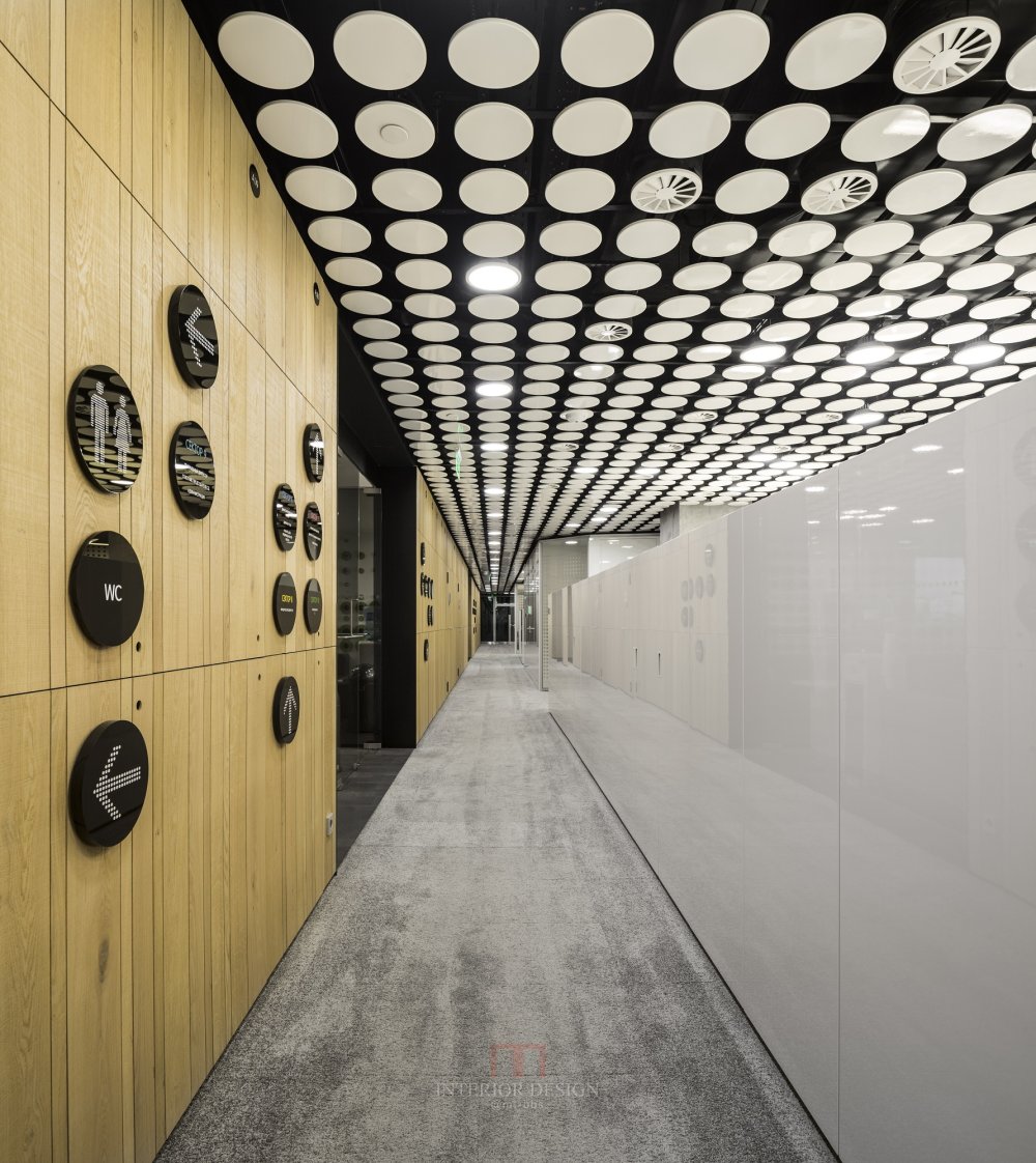 5509835de58eceb0fa000037_uralchem-headquarters-pedra-silva-arquitectos_09.jpg