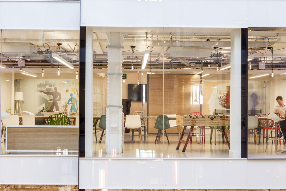 Mendeley Offices – London_21-Meeting-rooms-on-the-other-side-of-the-atrium-are-clearly-visible-from-The-Social.jpg