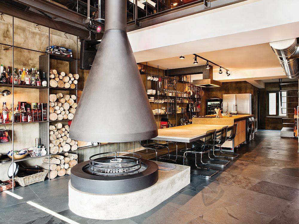 终极单身公寓  工业风_Innovative-fireplace-design-next-to-the-kitchen-and-dining-area.jpg