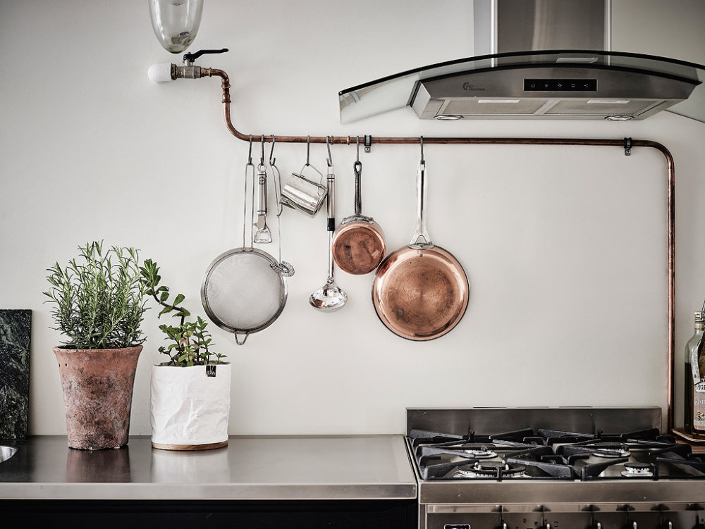 copper-pans-chrome-extractor-fan-Scandinavian-kitchen.jpg