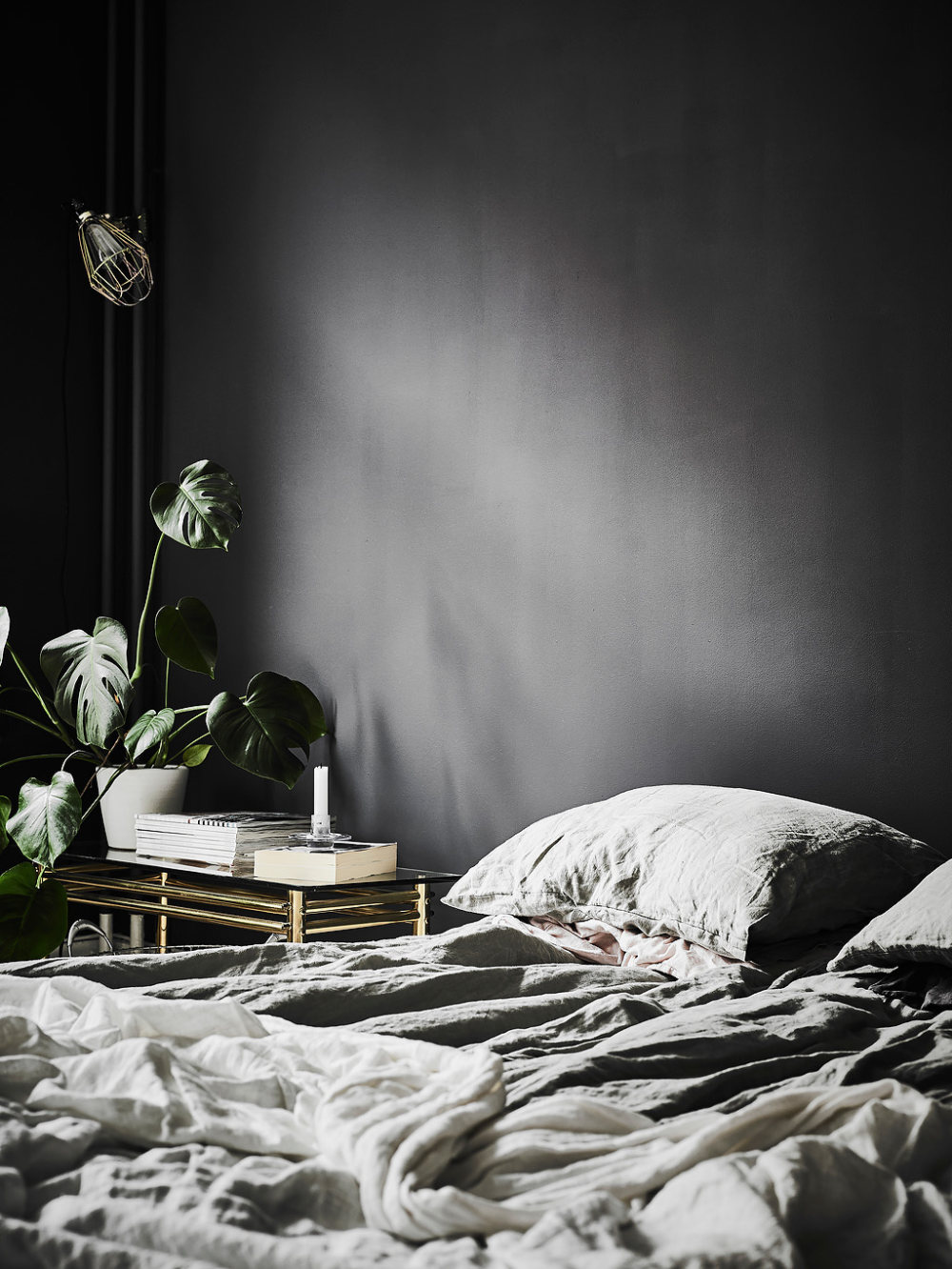 grey-duvet-black-wall-minimal-dark-bedroom.jpg