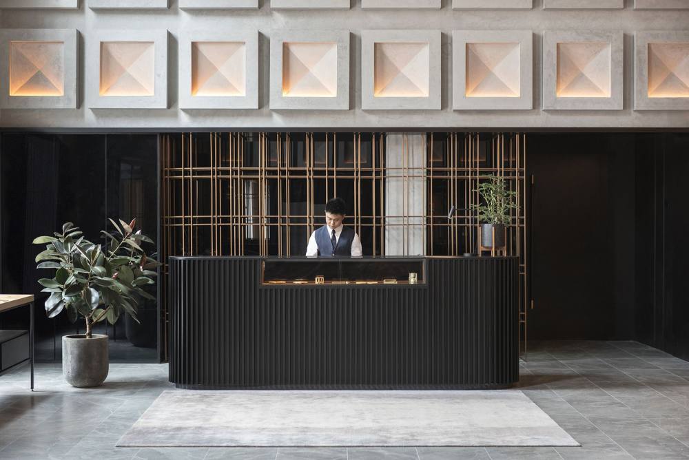 589ab8a4c4837-the-warehouse-hotel-lobby-front-desk.jpg