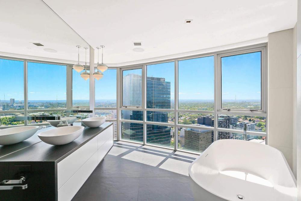 elegant-north-sydney-penthouse-streamlined-space-sweeping-city-views-01.jpg