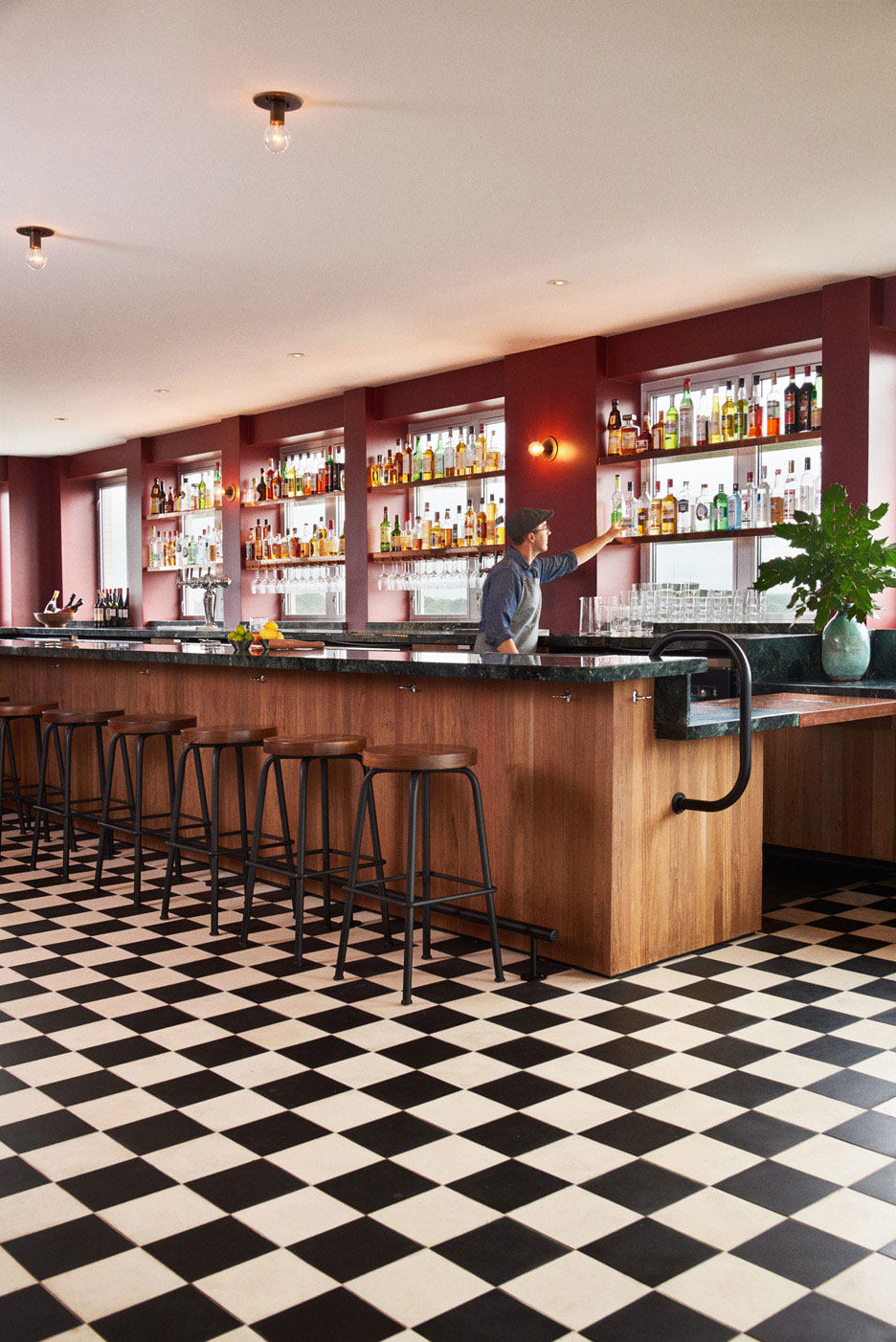 netmune-transforms-a-1960s-bank-into-the-durham-hotel-north-carolina-rushi-01.jpg