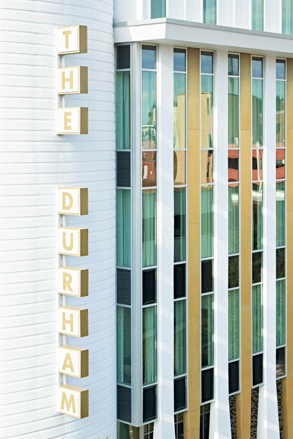 netmune-transforms-a-1960s-bank-into-the-durham-hotel-north-carolina-rushi-01.jpg