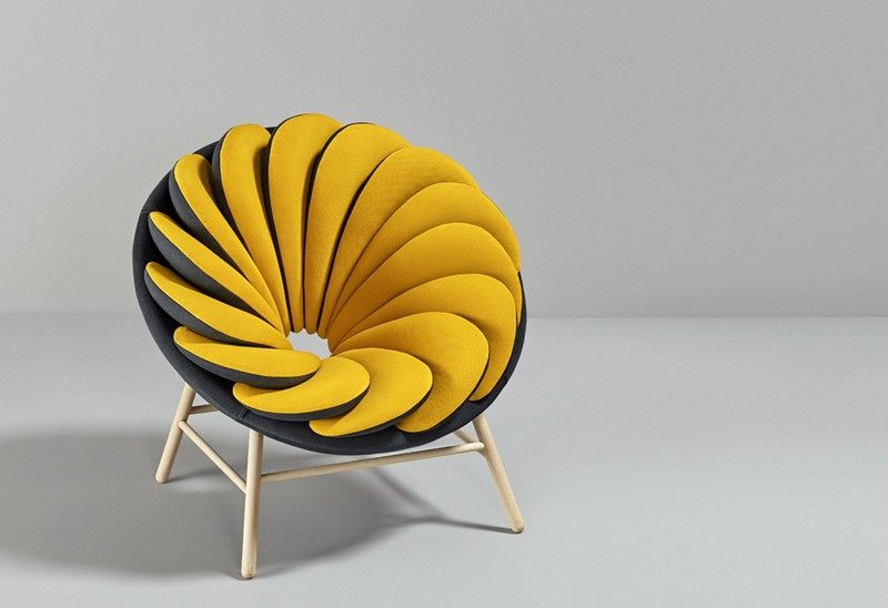 Quetzal-Armchair-14-Overlapped-Bicolor-Pillows-Creates-an-Amazing-Visual-Impact-1.jpg