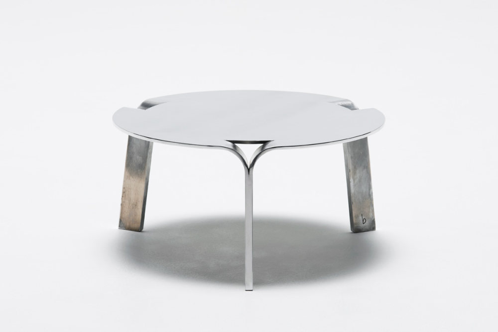 sleek-table-crafted-from-a-single-sheet-of-aluminum-2.jpg