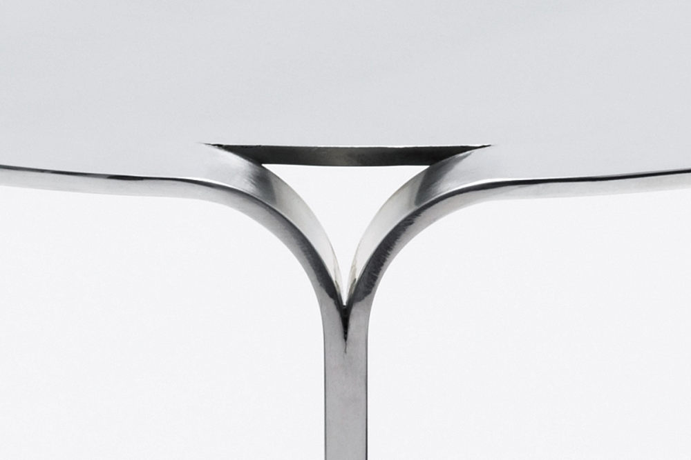 sleek-table-crafted-from-a-single-sheet-of-aluminum-2.jpg