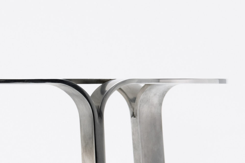 sleek-table-crafted-from-a-single-sheet-of-aluminum-2.jpg