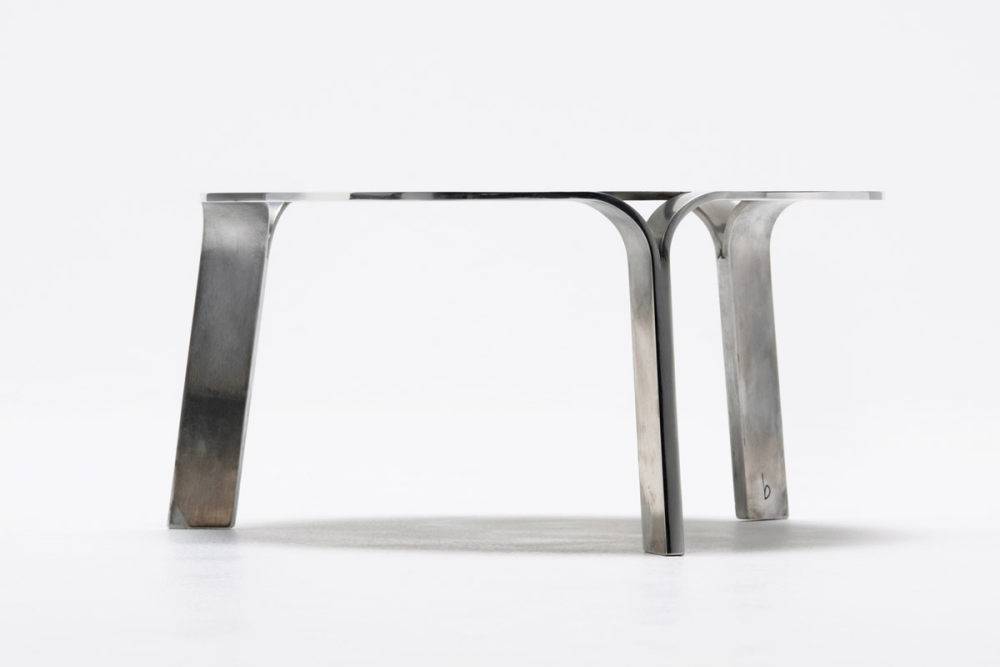 sleek-table-crafted-from-a-single-sheet-of-aluminum-2.jpg