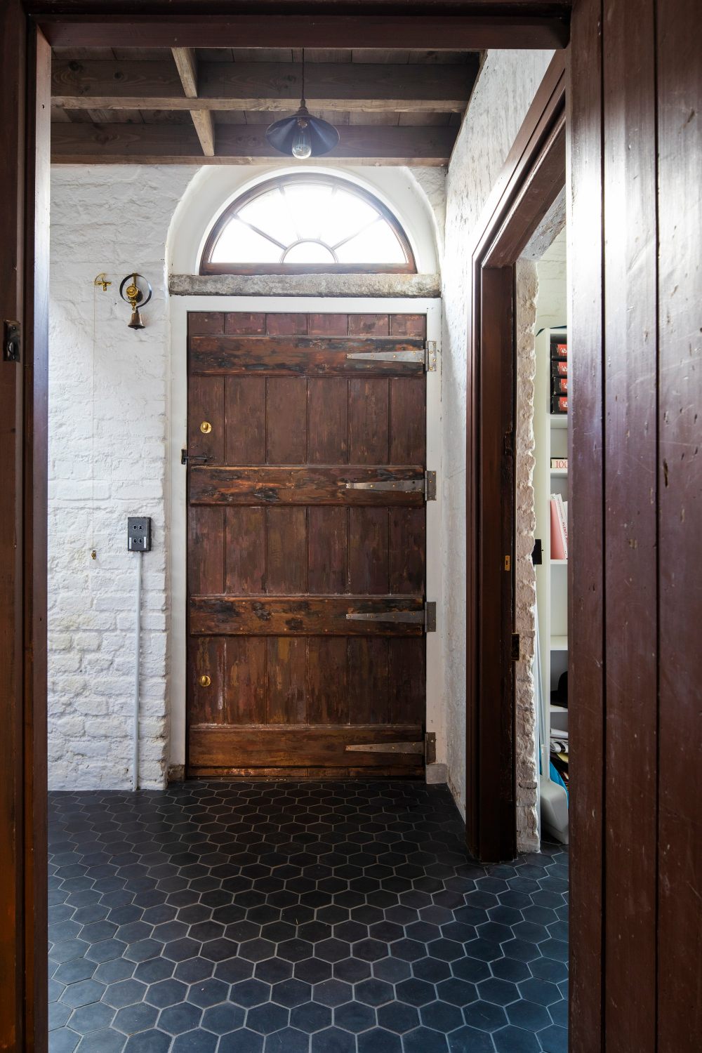 D2_Townhouse_Coach_house_hallway_restored_with_concrete_hexagone_tiles_Design_by_Jake_Moulson_Image_©Tim_Crocker_1923.jpg