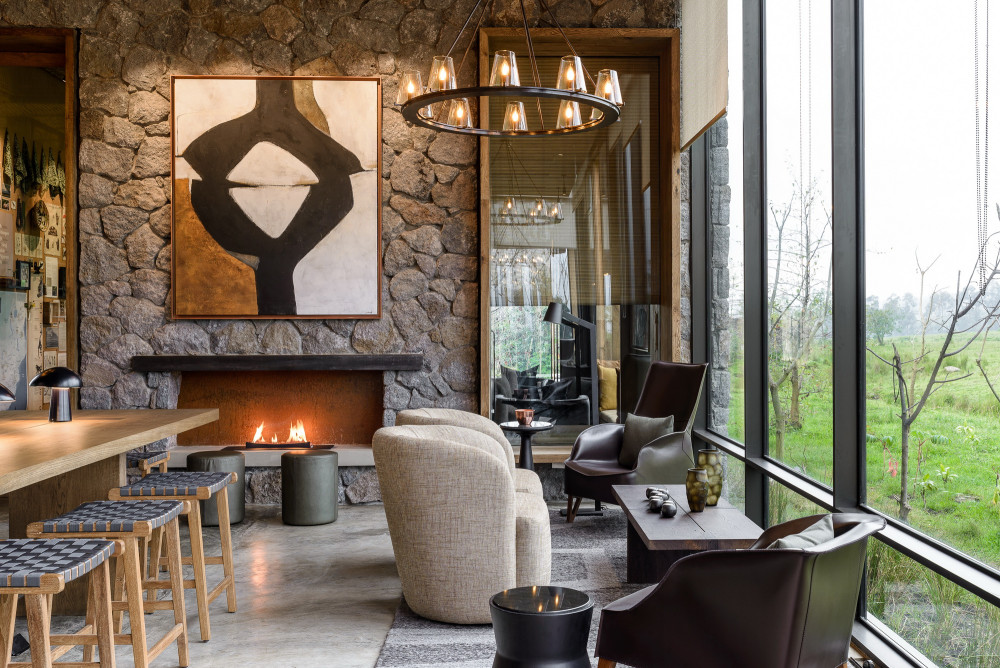 Singita-Kwitonda-Lodge-Lounge-Area-with-Fireplace.jpg